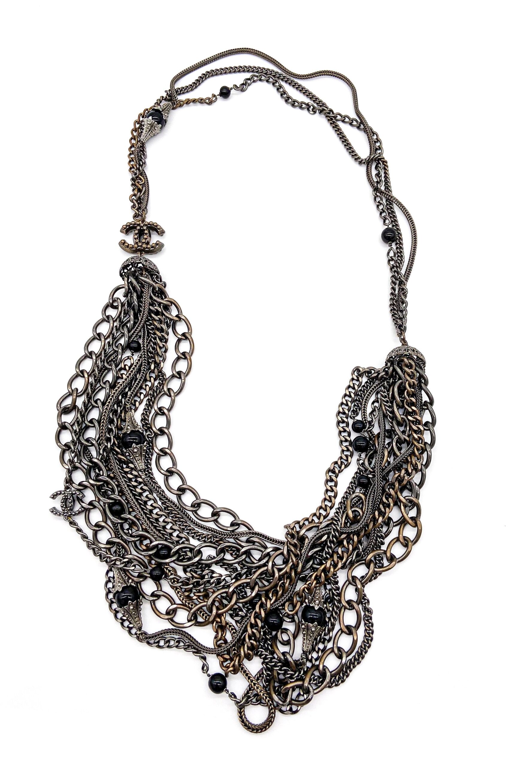 Chanel Multi Chain Necklace with Embedded CC Logos and Black Glass Balls Chanel Multi Chain Necklace with Embedded CC Logos and Black Glass Balls